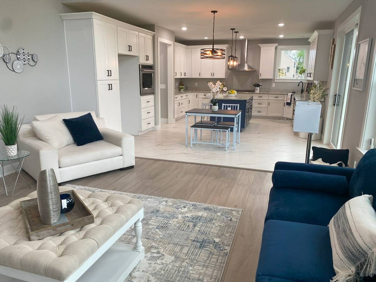 Bedroom with large windows and quality finishes in custom new construction