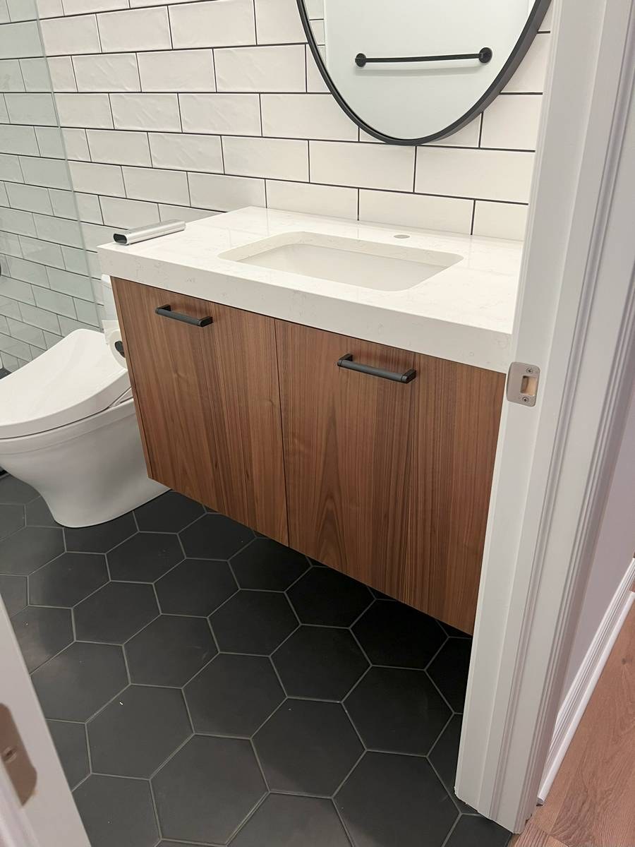 Bathroom renovation with custom tilework and new vanity